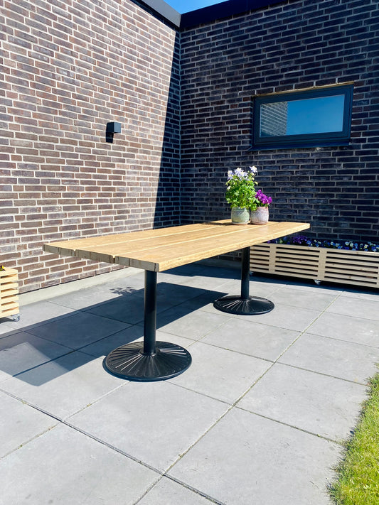 Garden table made of recycled planks