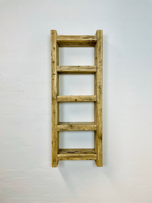 Wall shelf made of recycled planks